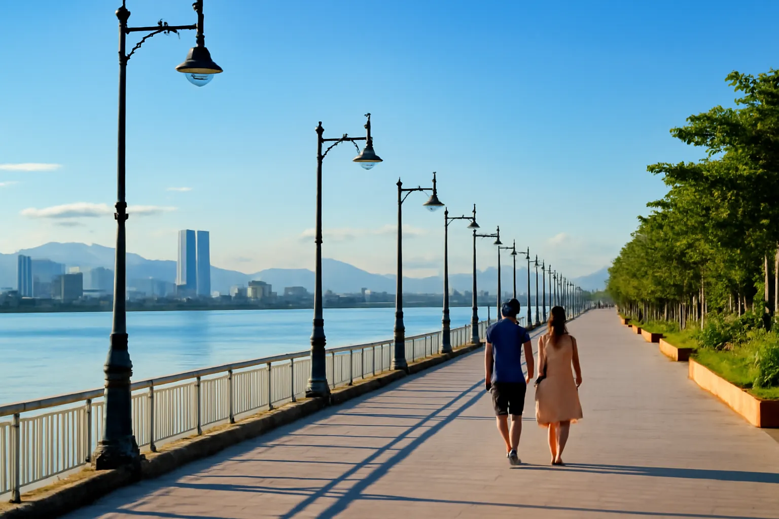 Hàng cột đèn đường ven sông xa dần lúc chạng vạng